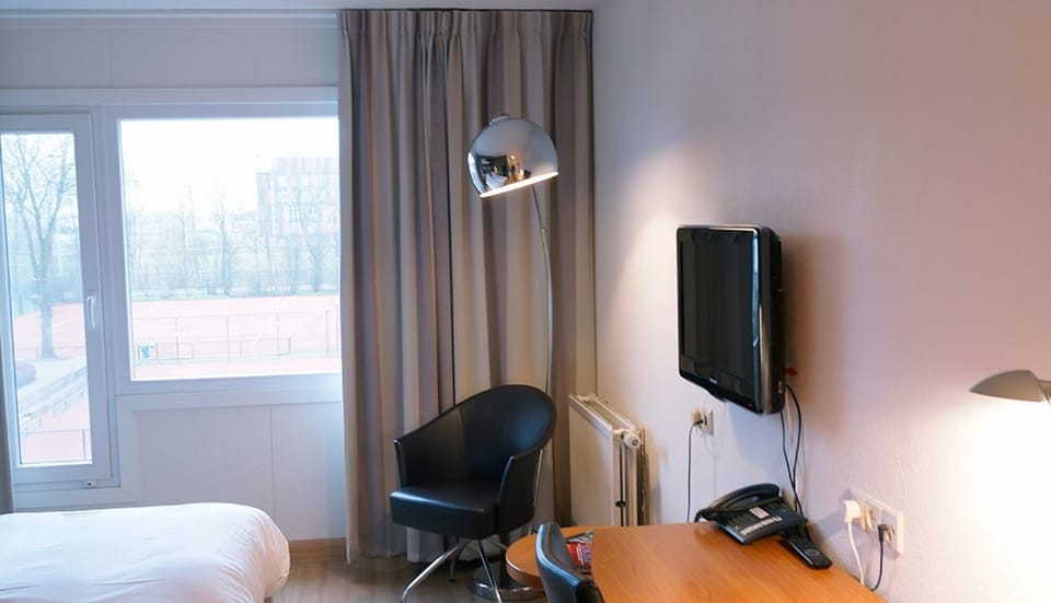 Unit with 2 Single beds. Exact unit will be assigned upon arrival. Views, colors, and decor may vary.