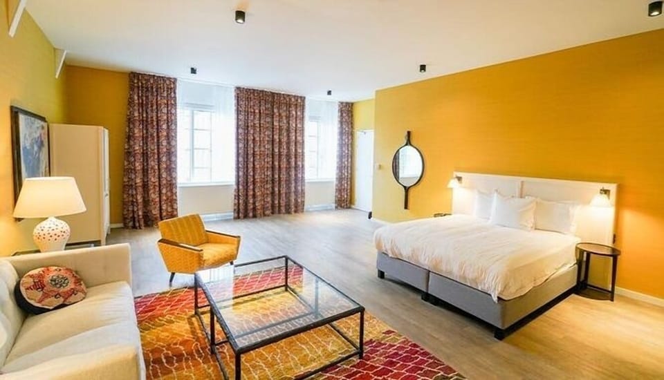 Unit with king bed. Exact unit will be assigned upon arrival. Views, colors, and decor may vary.
