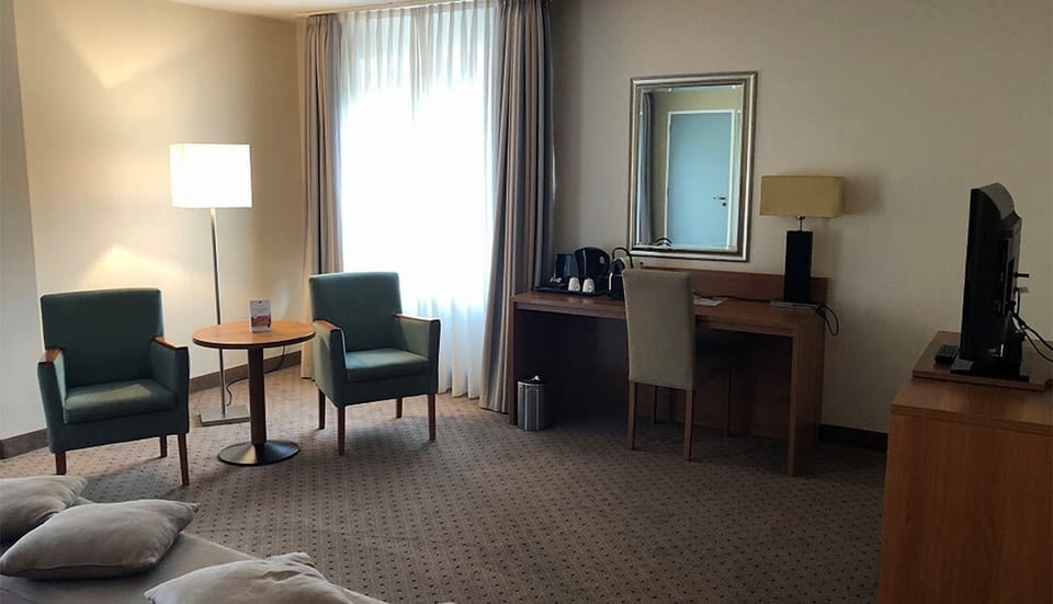 In-room amenities. Unit with king bed. Exact unit will be assigned upon arrival. Views, colors, and decor may vary.