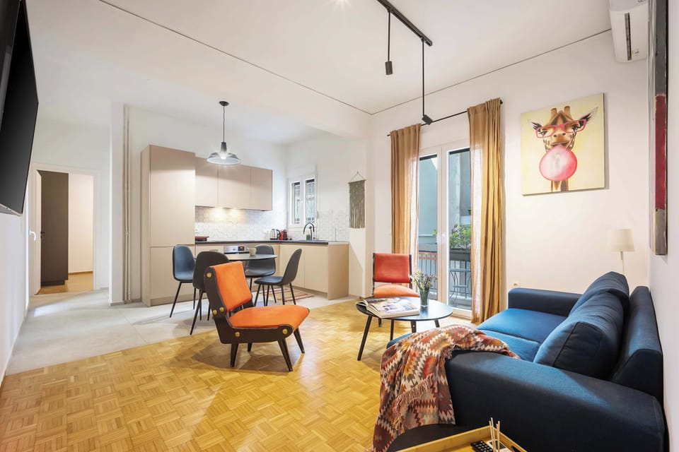 Spacious open-plan living area with soft natural light, creating a warm, comfortable place to unwind together