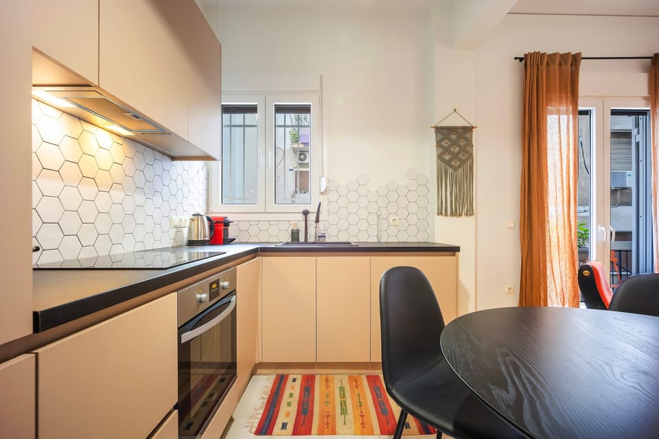 Warm, sunlit kitchen layout blending soft tones and open flow, creating a welcoming environment for easy meal preparation