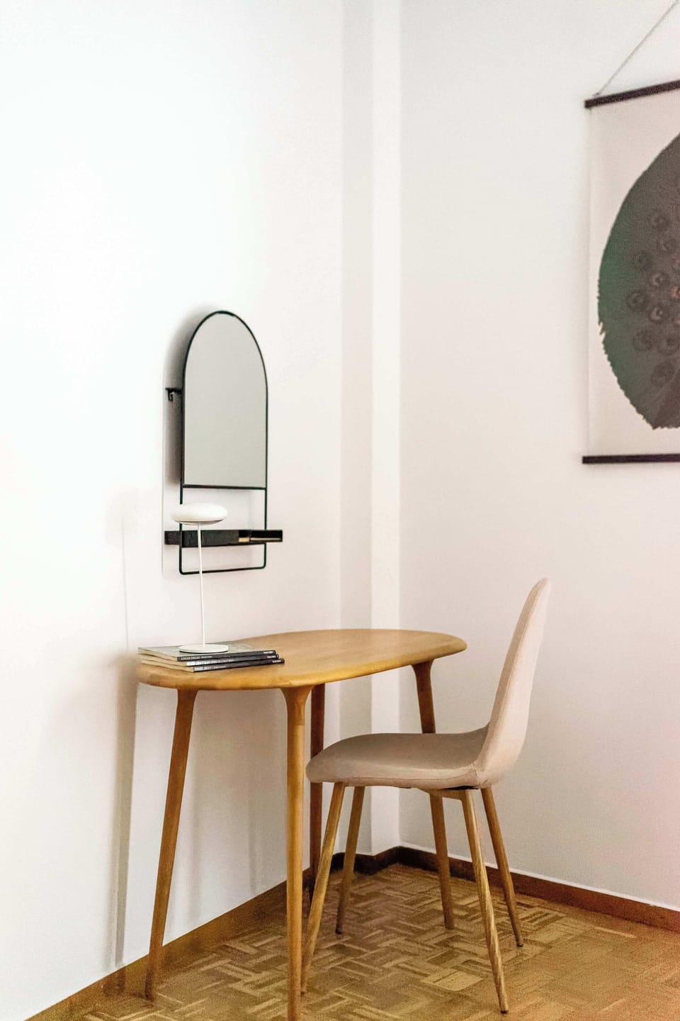 Simple workspace with natural wood tones offers a quiet, comfortable spot for reading, writing, or planning outings.