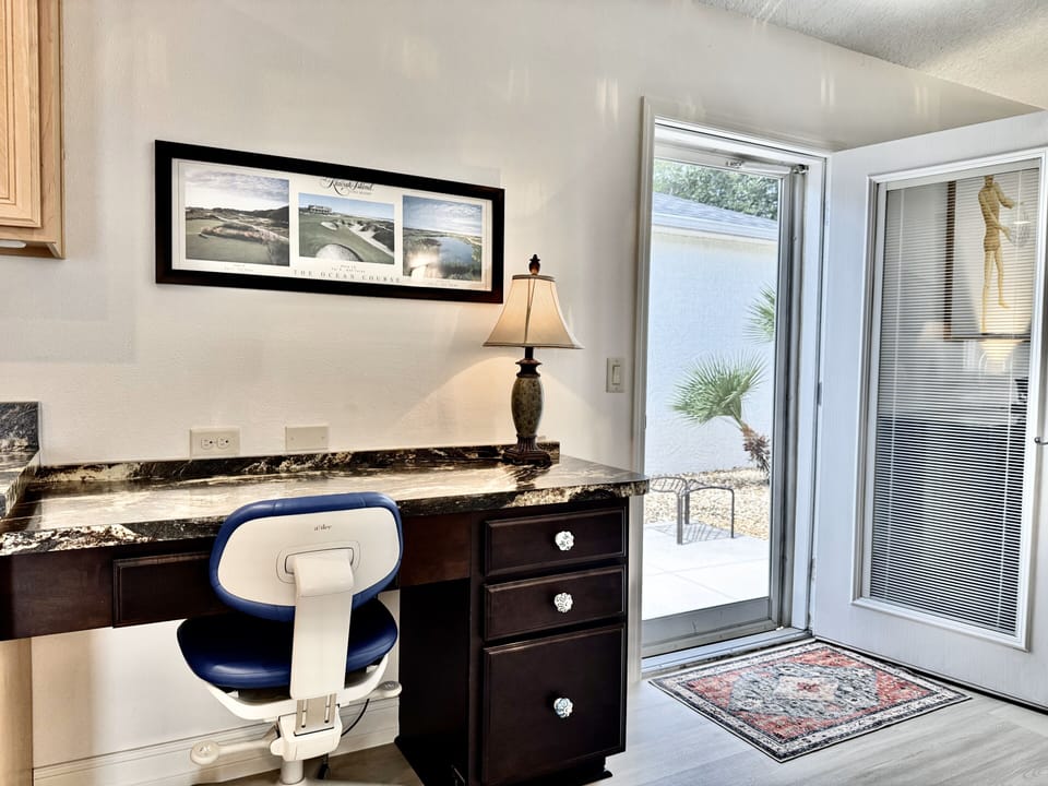 Your Work Space is Next to the Side Patio Door that Brings you to the Grill