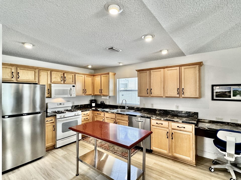Fully Equipped Kitchen with a Work Space to the Right