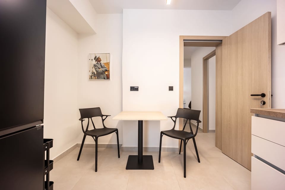 Clean lines, intimate setting, and practical design offer refined simplicity in a quiet, connected neighborhood