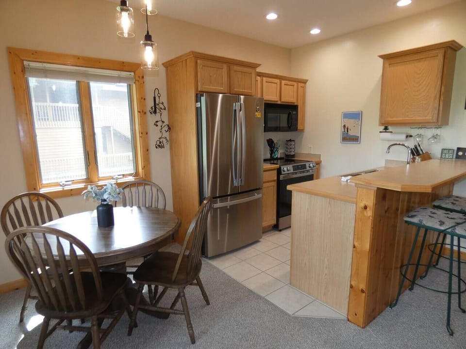 Full kitchen and dining space