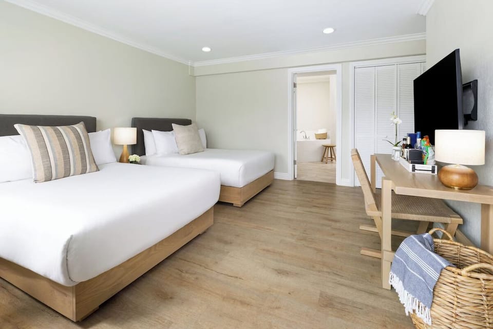 Unit with 2 Full beds. Exact unit will be assigned upon arrival. Views, colors, and decor may vary.