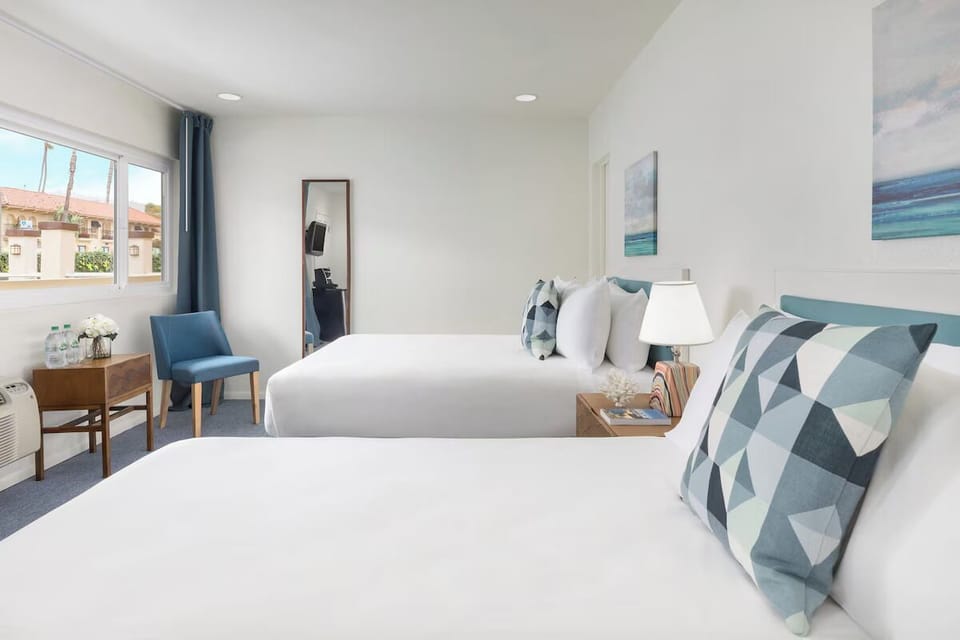 Unit with 2 Double beds. Exact unit will be assigned upon arrival. Views, colors, and decor may vary.