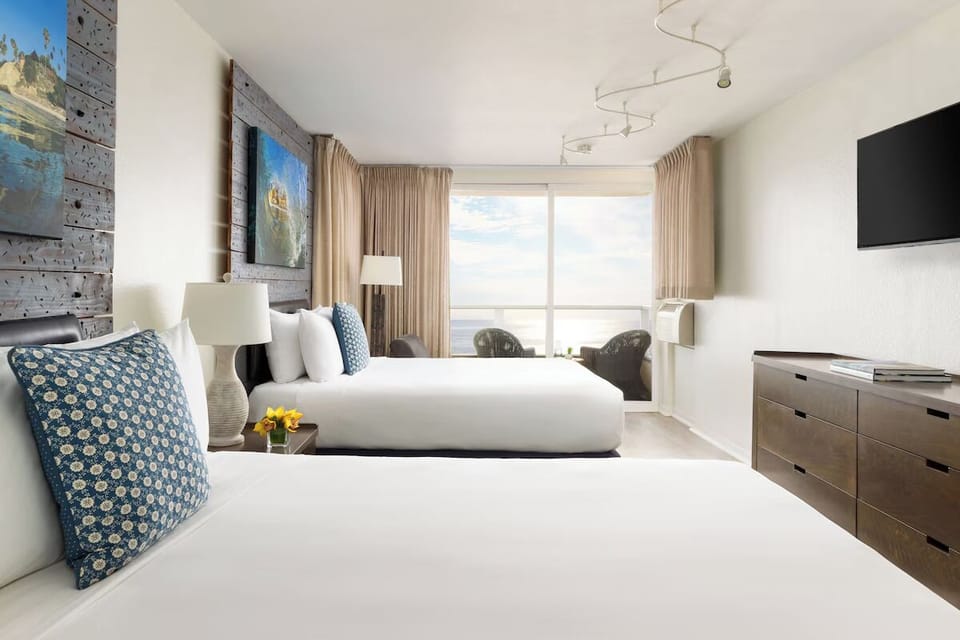 Unit with Two Queen beds. Exact unit will be assigned upon arrival. Views, colors, and decor may vary.