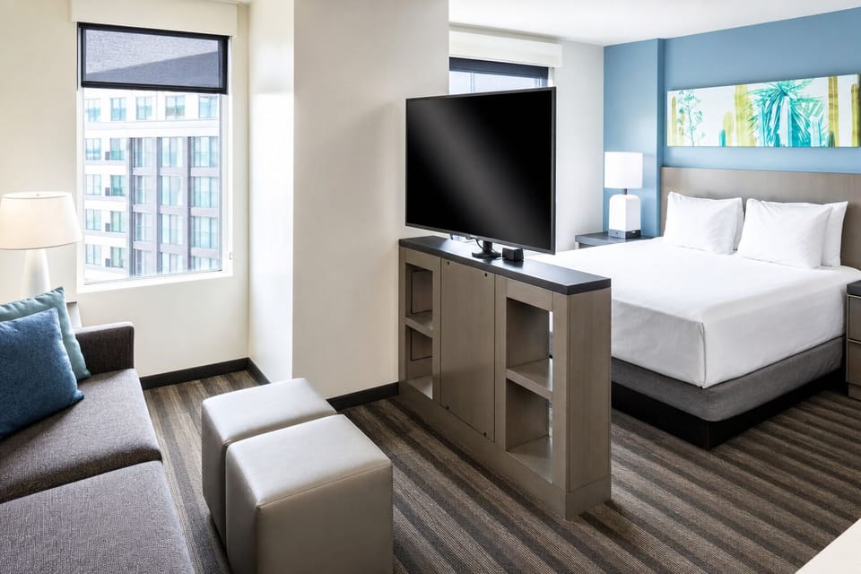 Settle into a bright suite with lounge space and views.