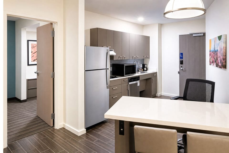 Cook and dine with ease in a sleek, modern kitchenette.