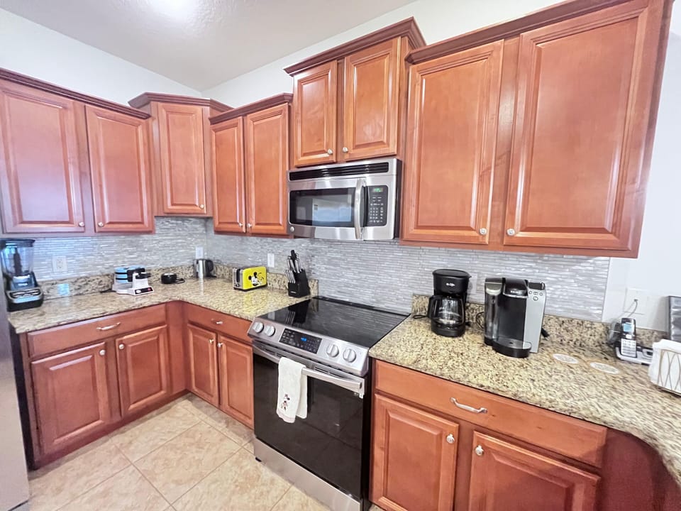 Ample cabinetry makes meal prep and storage  breeze.