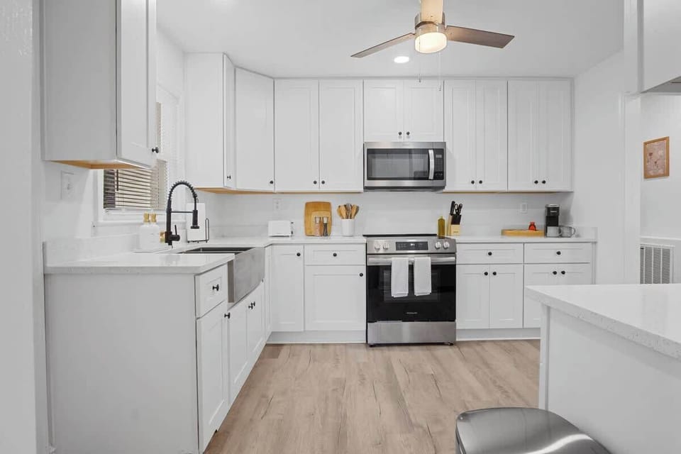 With modern appliances and a ceiling fan, ensuring comfort and convenience.