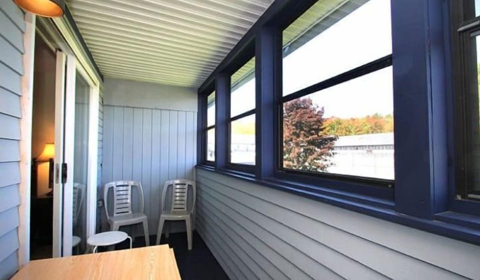 Enjoy morning coffee on your private balcony with scenic views all around.