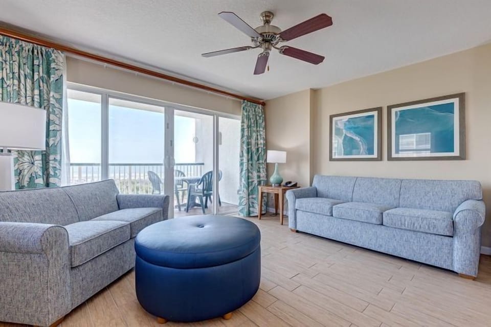 Enjoy cozy living spaces with stunning oceanfront views from the comfort of your private balcony.