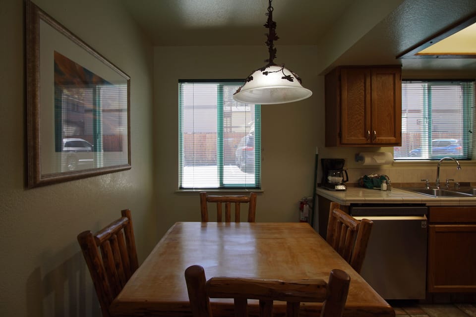 Rustic dining area with natural wooden table