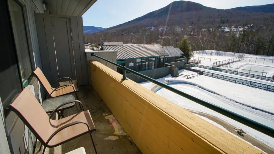 Step onto your private balcony and soak in breathtaking mountain views, ensuring a tranquil atmosphere that adds to your stay, highlighted by convenient access to nearby outdoor activities.