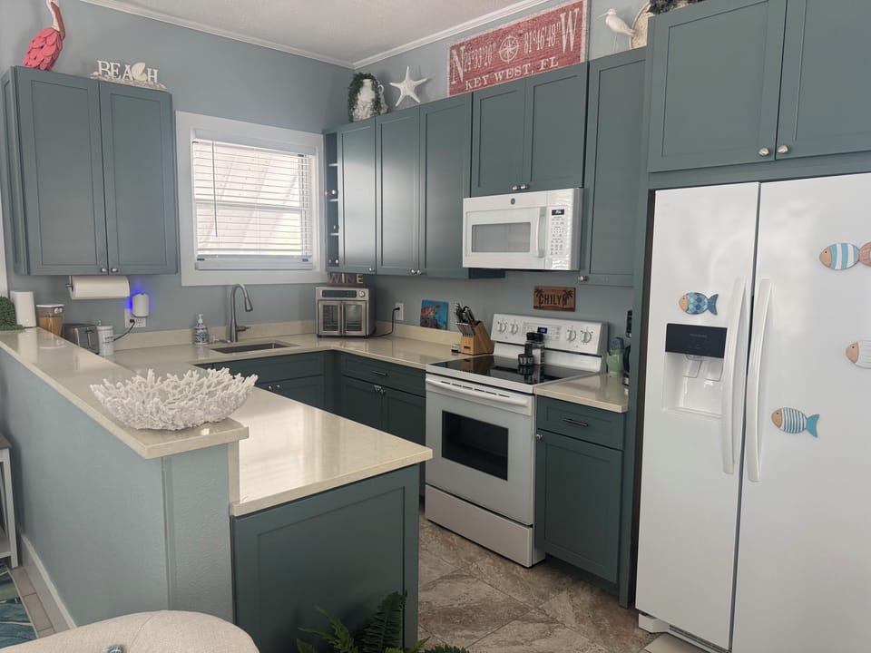 Fully equipped Kitchen- dishes, pots and pans, spices