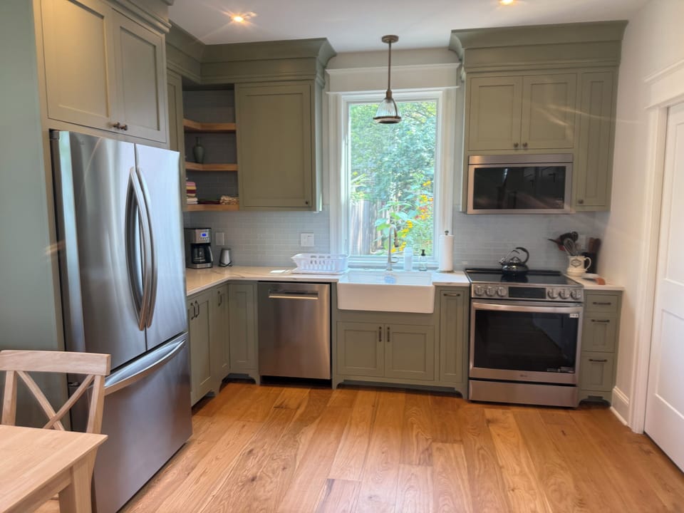 Fully-equipped kitchen with induction stovetop