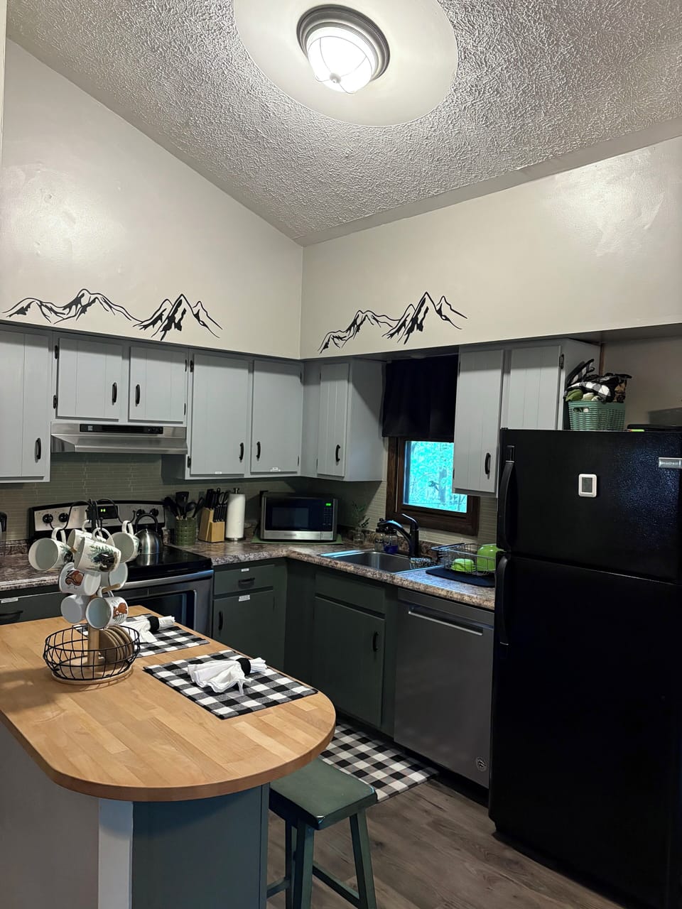 Kitchen with pots, pans, appliances
