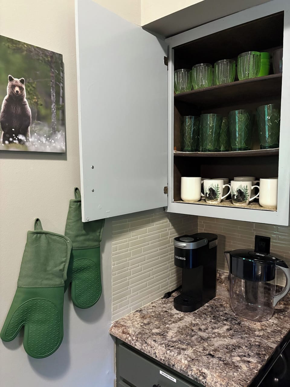 Cabinets with dinnerware, drinkware