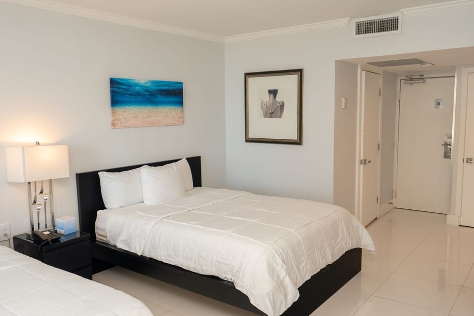 Drift off in plush linens under soft, restful lighting
