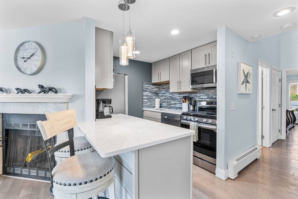 Fully-equipped kitchen with seating for two at the counter plus a dining table to eat your meals at. We provide all the essentials, including a drip coffee maker.