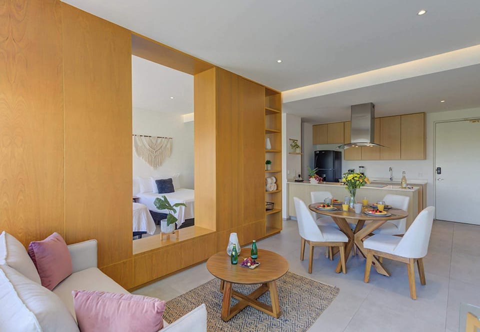 Stylish living nook flowing into a bright dining space
