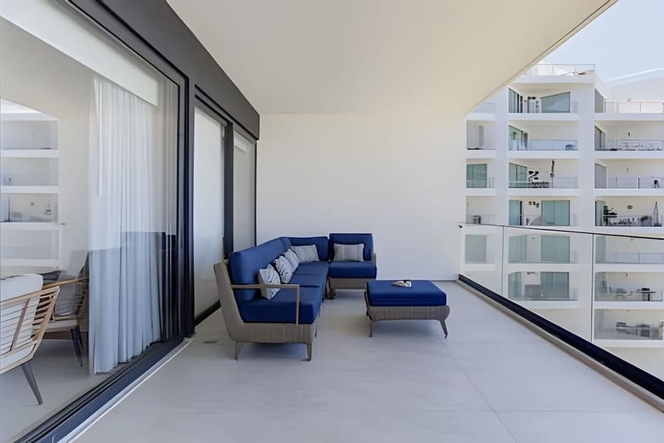 Oceanfront balcony w/ seating, a breezy spot to sip coffee & take in the sweeping water views