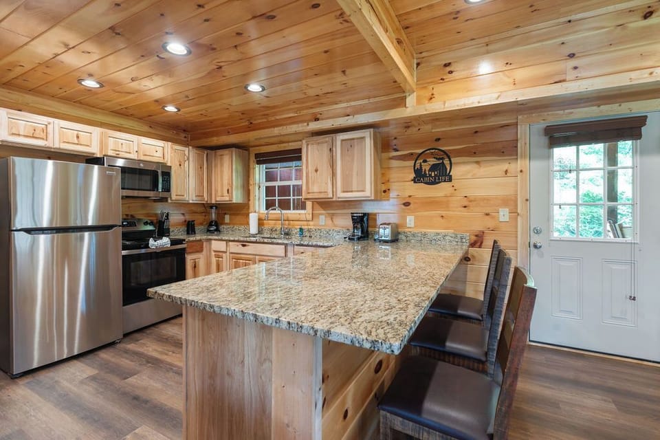 Cook in style with granite counters, stainless appliances & breakfast bar.