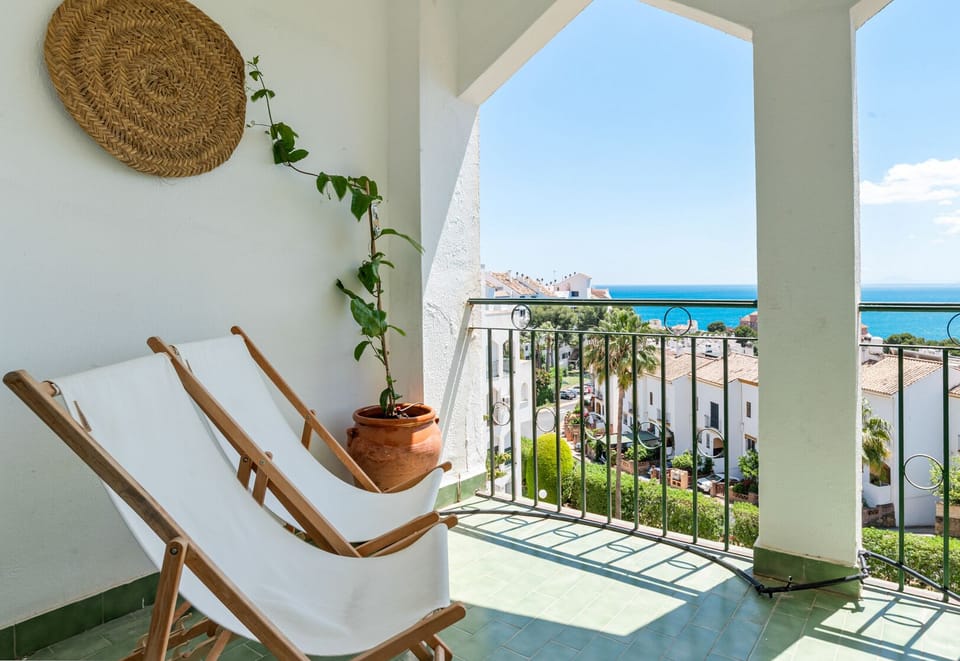 Outdoor lounge area with seaview.