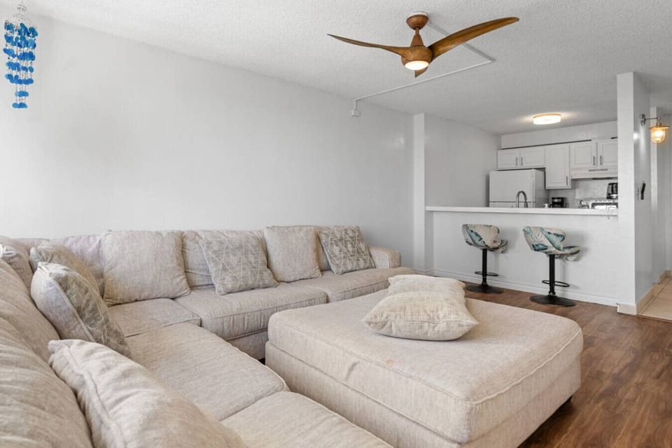 Spacious open-layout living area that flows seamlessly from the kitchen to the lounge—perfect for relaxing or entertaining.