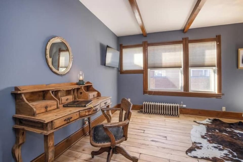 Rest comfortably in a spacious bedroom in a historic Milwaukee retreat