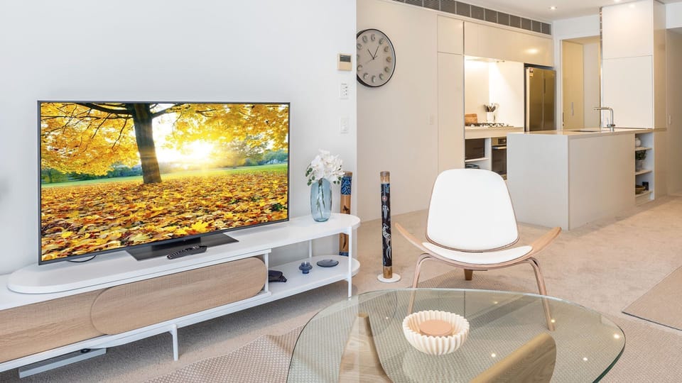 Sleek, modern, and entertainment-ready. Our stylish living area features high-end designer seating and a curated media setup for your ultimate comfort.