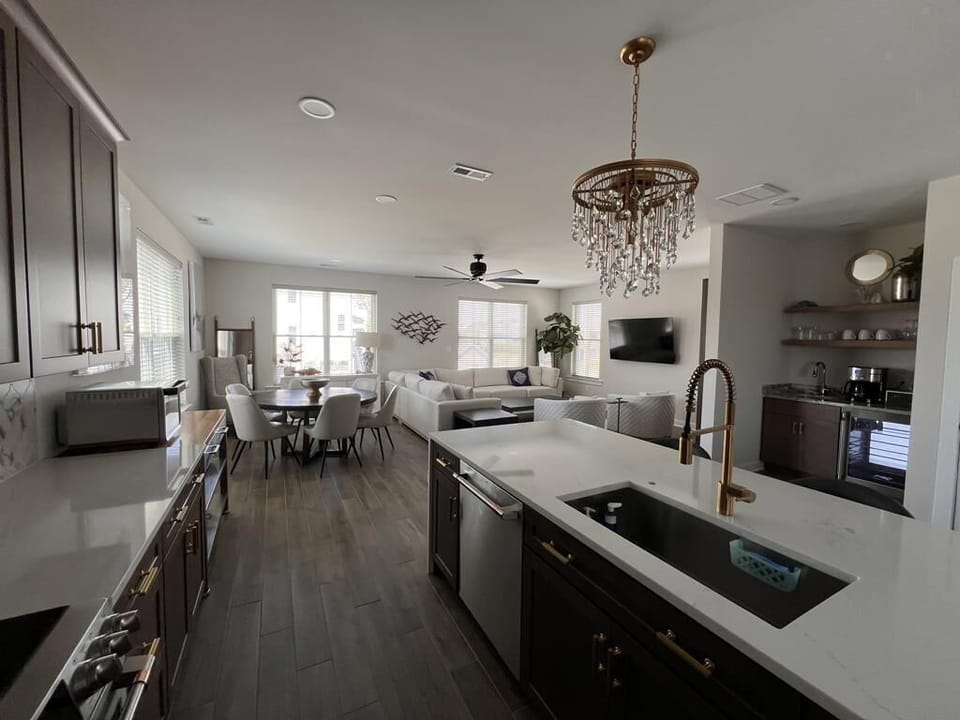 Spacious dining area with a custom bench and farmhouse-style table, ideal for family meals.
