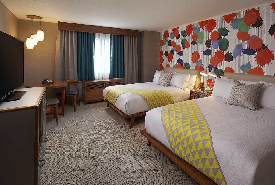 Stretch out in a spacious room with colorful, boutique style.