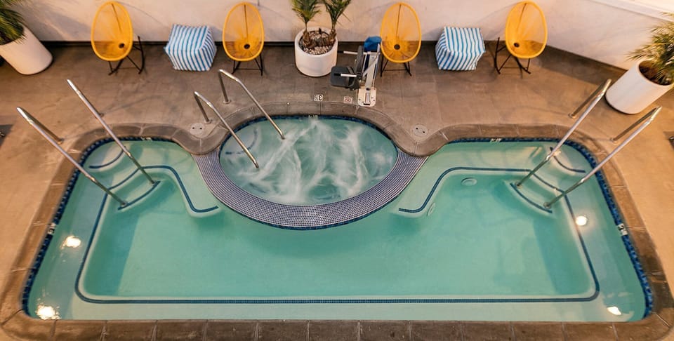 Cool off with a quick dip and bubbling spa jets.
