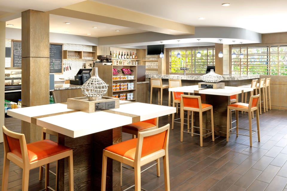 Enjoy relaxed conversation at community tables with plenty of space.