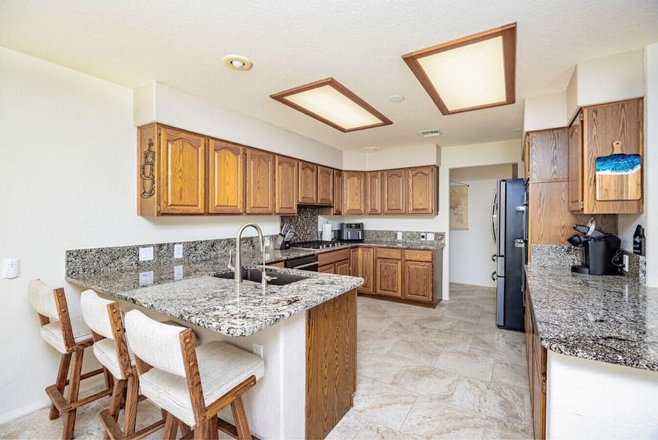Fully equipped kitchen with stainless steel appliances