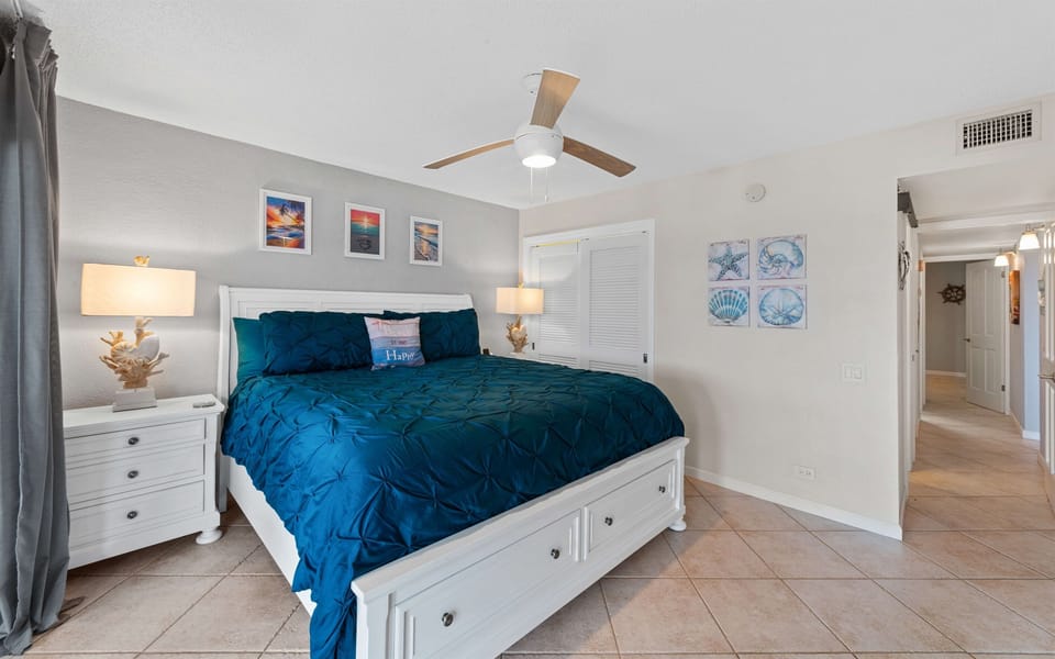 The primary bedroom includes a king bed, large closet, and access to the balcony!
