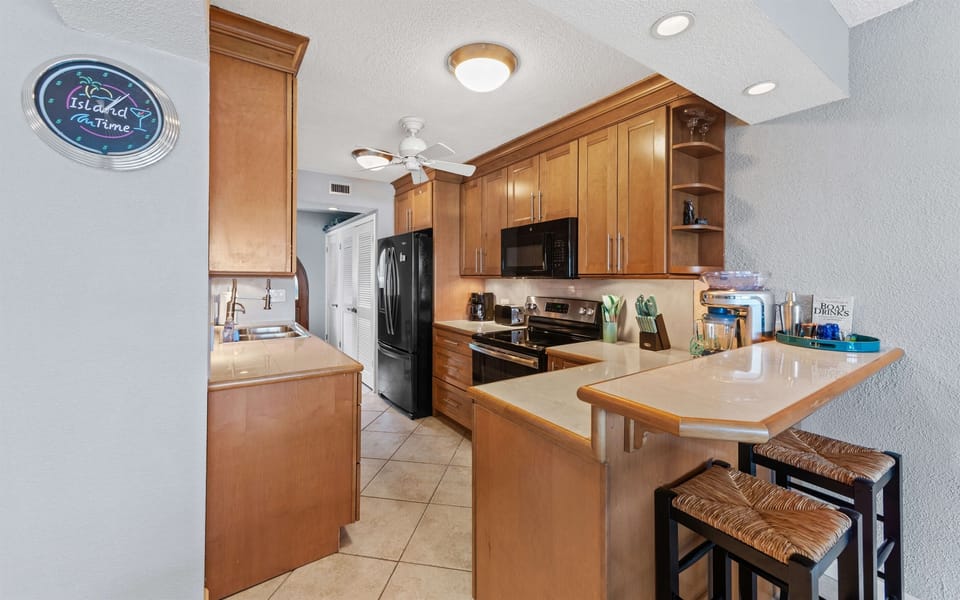 A fully equipped kitchen with modern appliances, ready for family meals or romantic dinners.