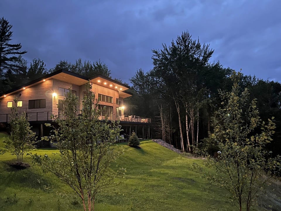 The rustic-chic contemporary home, Maple Lodge, is the larger of the 2 homes featuring 4 bedrooms and 3 bathrooms