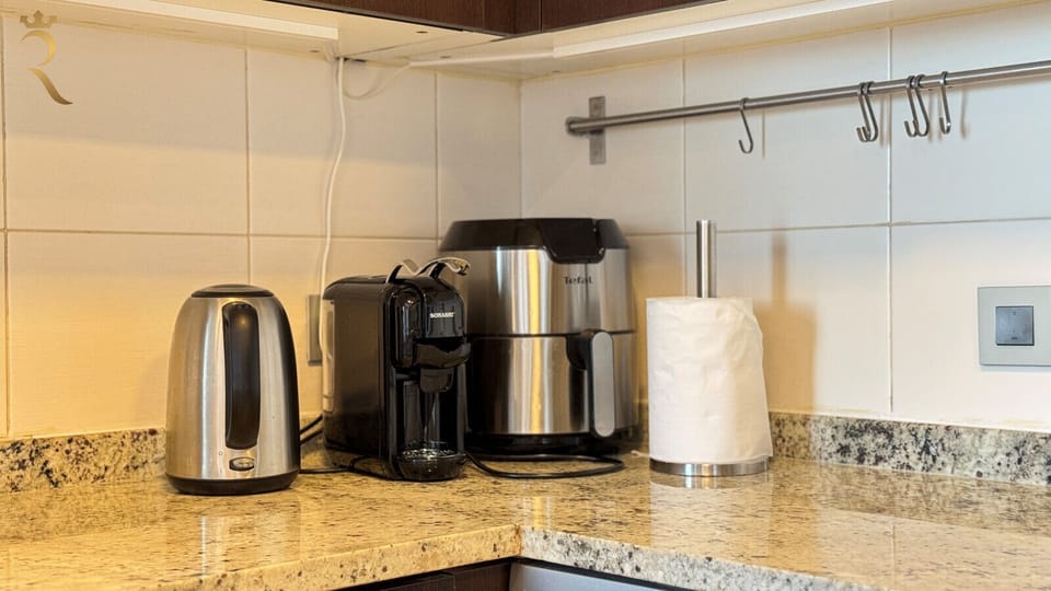 Coffee & Kettle Includes coffee maker and electric kettle for daily beverages.