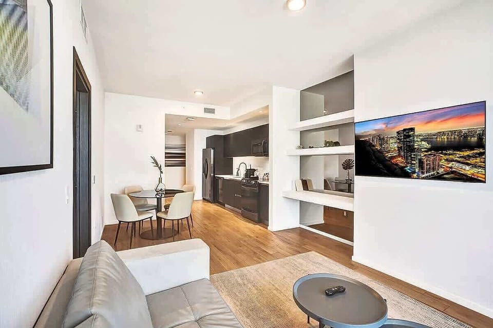 Open living area with view toward kitchen and dining