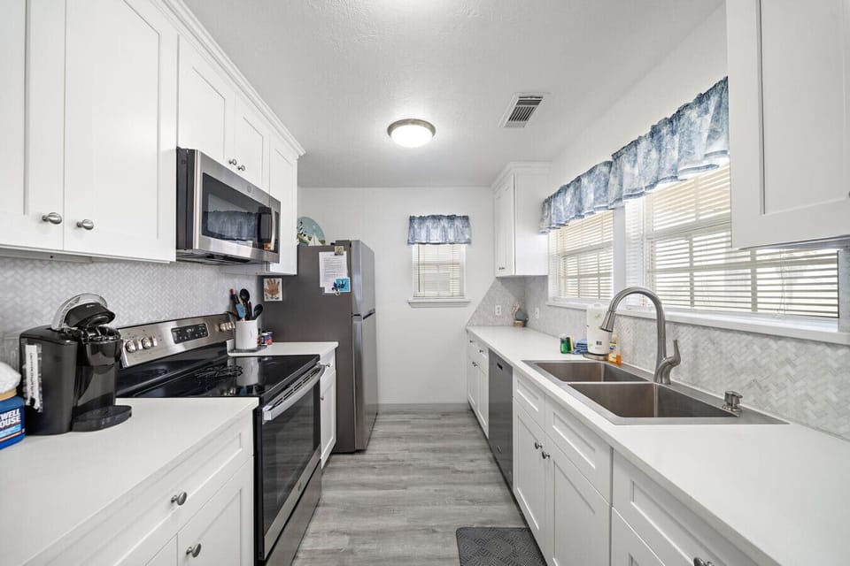 Whip up delicious meals in this charming kitchen