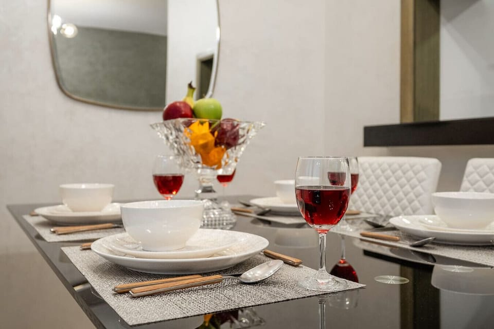 Dining Area: Elegant table settings await your culinary adventures in this stylish space!