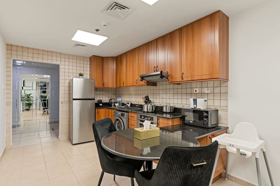 Kitchen Delight: Cook gourmet meals in this stylish, fully-equipped space with modern appliances!