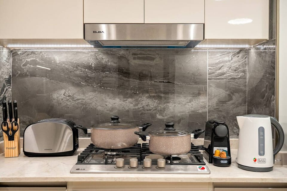 Gourmet Kitchen: Whip up culinary delights with sleek appliances and stylish finishes!