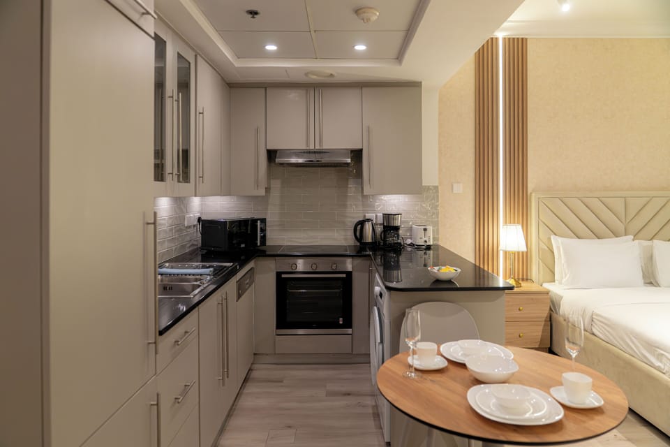 Full kitchen and dining area.