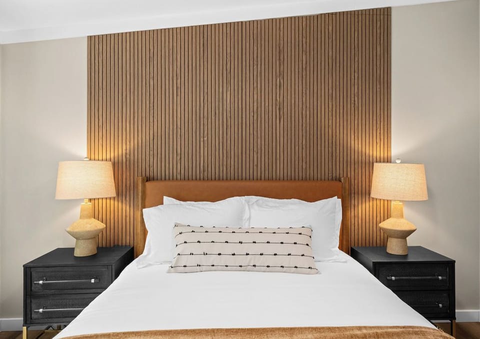 This bed offers a serene space to relax and recharge.